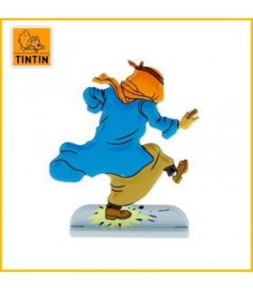 Figurine en métal de collection Tintin marche sur un pétard