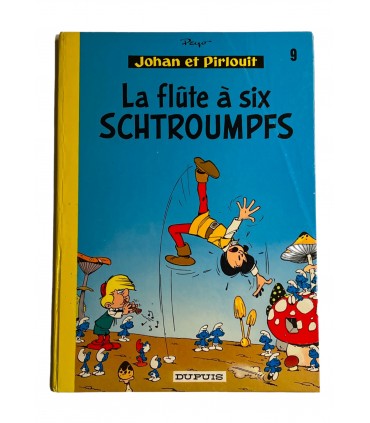 La Flûte à six Schtroumpfs. Édition en couleurs - 1974. Dessin accompagné d'un envoi autographe.