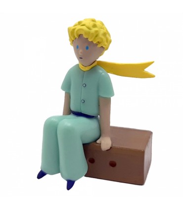 Le Petit Prince assis sur sa Caisse